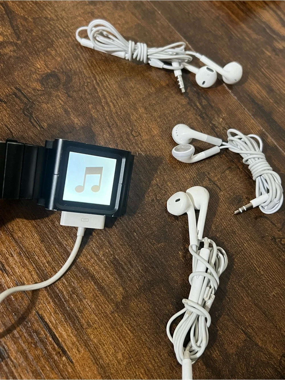 Apple Black iPod Nano with White Earbuds